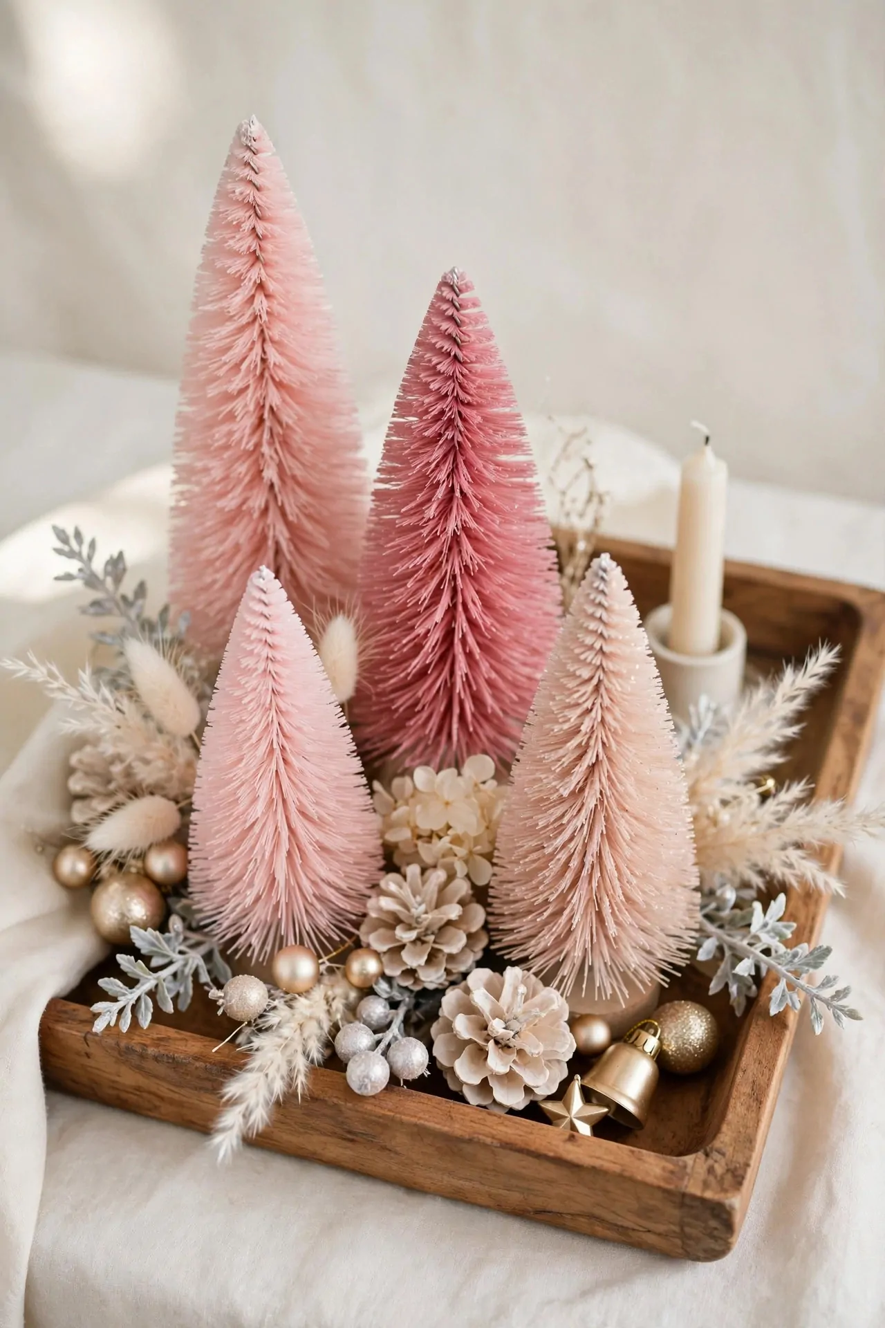 21 Pink Christmas Decor Ideas (Trees, Mantels and More) 10 Tabletop arrangement of pink bottle brush Christmas trees of different heights